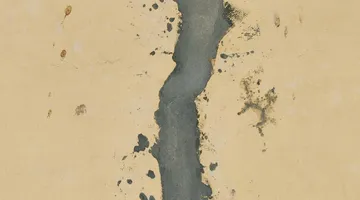 Joint compound applied along a drywall seam with a wide finishing knife