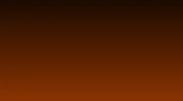 Residential gas furnace burner glowing orange in a home basement utility room
