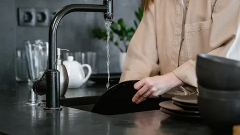Under-sink garbage disposal unit with drain plumbing, how to fix a garbage disposal that hums