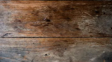 Wood floor planks with visible scratch marks, how to repair a scratch in hardwood floor