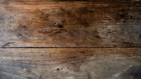Wood floor planks with visible scratch marks, how to repair a scratch in hardwood floor