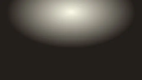 Warm ceiling light illuminating a home interior room from above