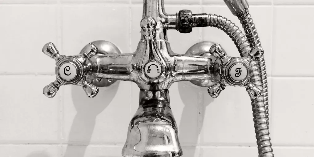 Chrome shower mixer valve with cross handles on tile, how to remove a stuck shower cartridge