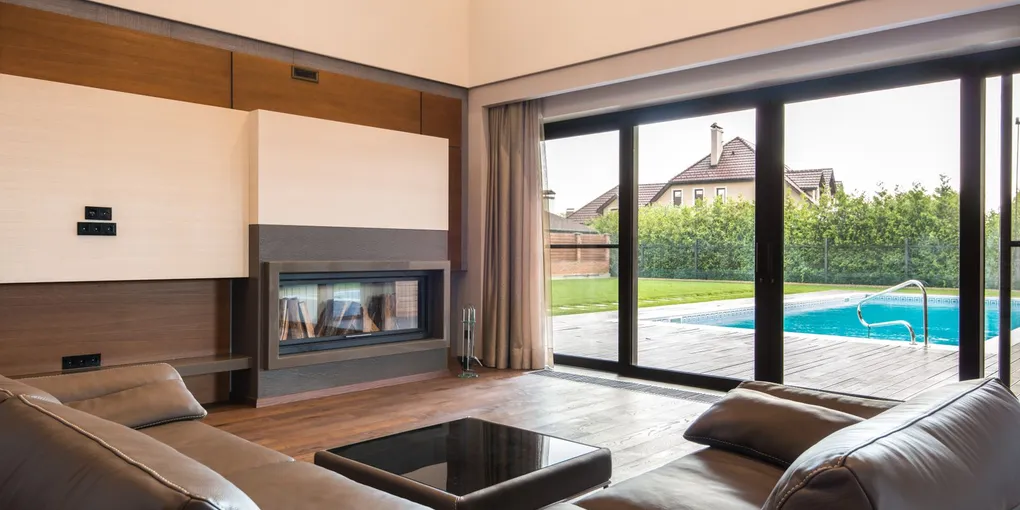 Large sliding glass patio door in a living room, fixing a sticky sliding glass door