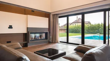 Large sliding glass patio door in a living room, fixing a sticky sliding glass door