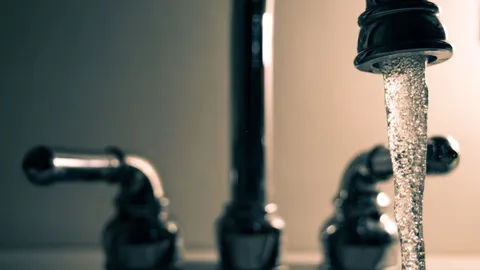 Bathroom faucet running a thin stream of water, why is my water pressure low